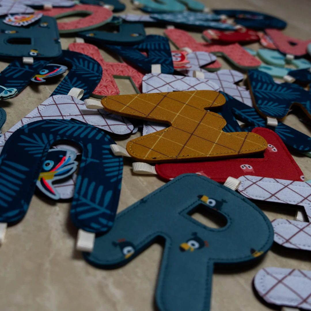 Naamslinger - letterslinger voor babykamer