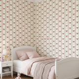 kinderkamer behang met strikjes en strepen. speciaal ontworpen voor meisjes