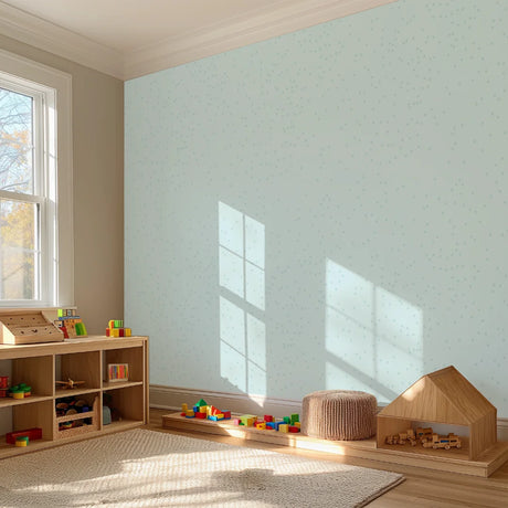 lichtblauw speels stippenbehang speciaal ontworpen voor kinderkamers en babykamers
