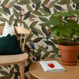 Bladeren behang met vogels voor babykamers of kinderkamers
